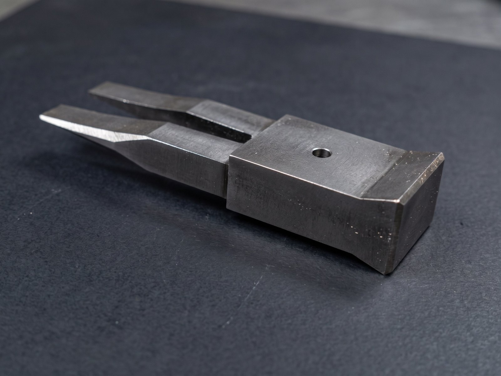 förk, a machined steel breaching wedge